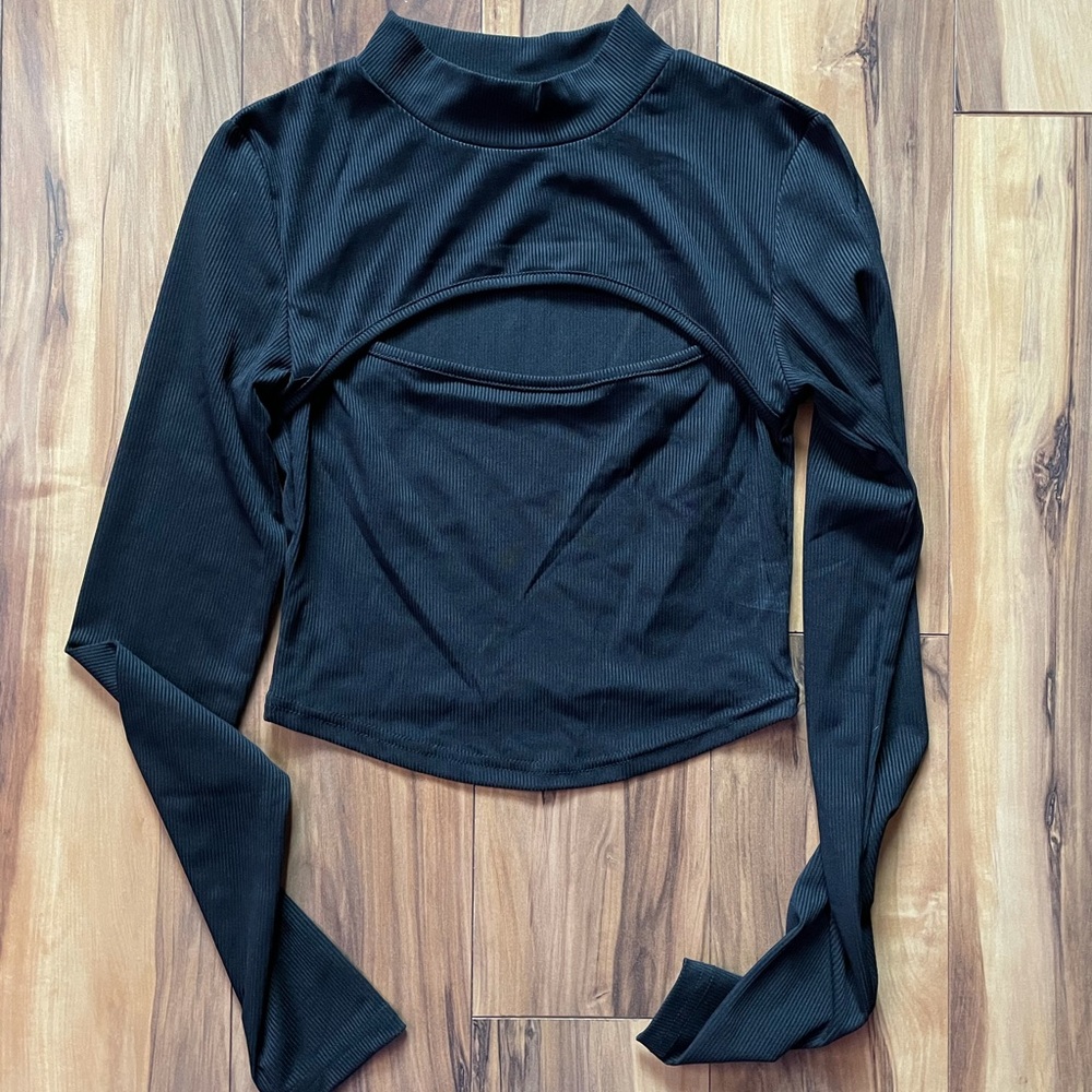 Black long sleeve shirt with cut out on the front